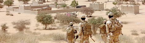 Soldiers Train In The Shadow of A Real Threat