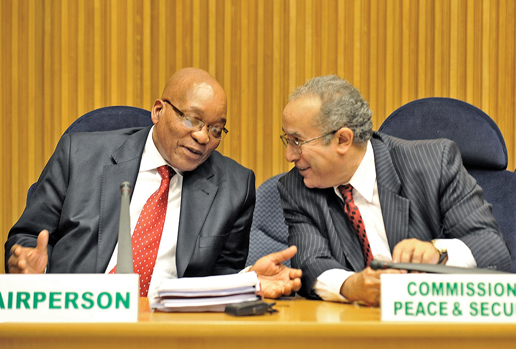 South African President Jacob Zuma, left, speaks with then-African Union Commissioner for Peace and Security Ramtane Lamamra during an AU Peace and Security Council meeting in Addis Ababa, Ethiopia, in 2011. [AFP/GETTY IMAGES]