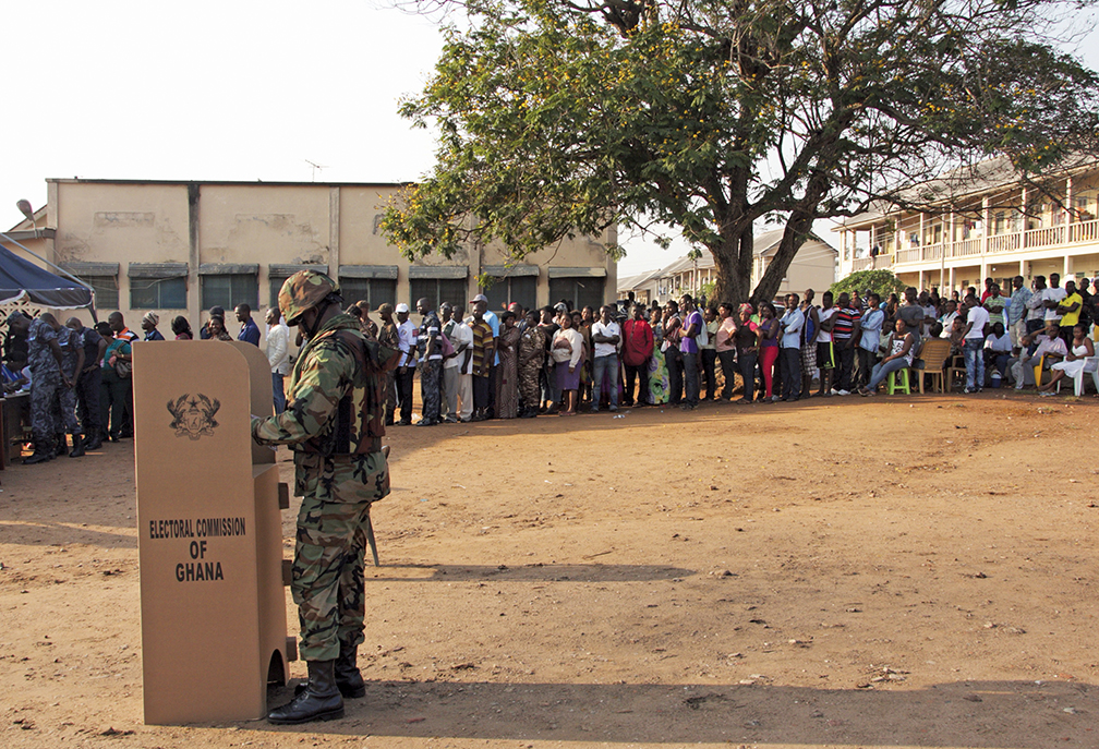 A Ghanaian Soldier casts his ballot at a polling station in Accra on December 7, 2012, during national elections. [afp/getty images]