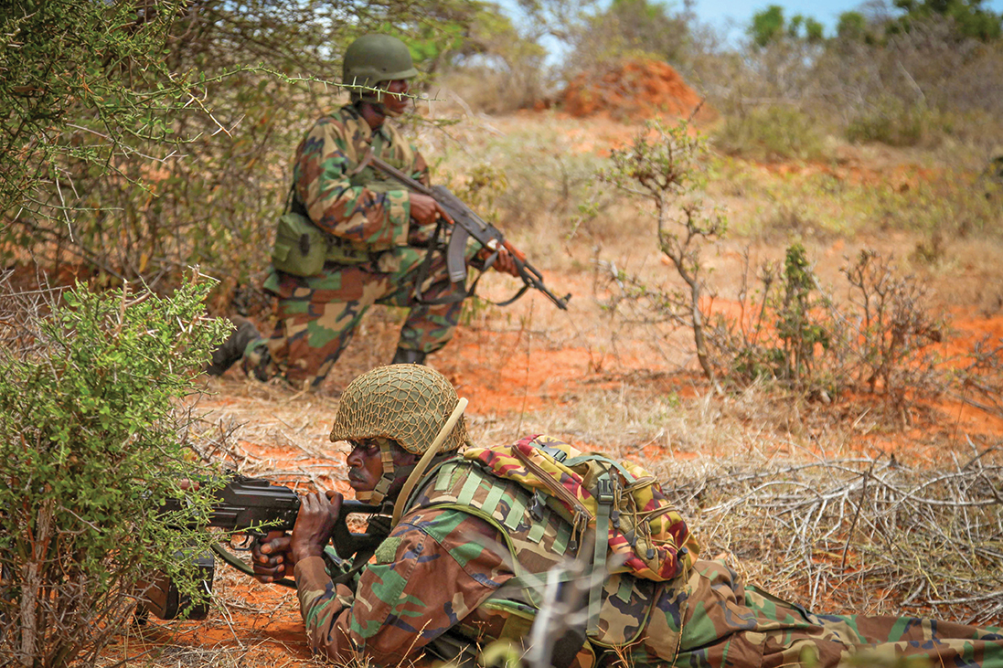 Sierra Leonian troops conduct a patrol near the city of Kismayo in southern Somalia. The nation has sent 850 Soldiers to assist in the peacekeeping effort in Somalia. [AU UN IST PHOTO/Jacob Willmer]