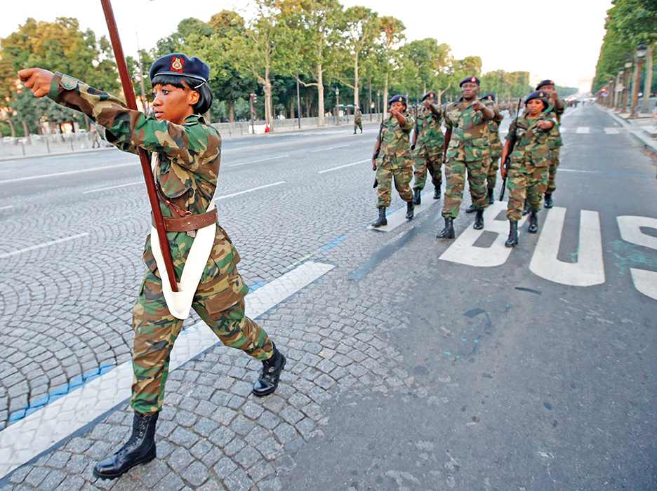 Soldiers from Sierra Leone rehearse for the French Bastille Day parade in Paris in July 2013. Sierra Leone has made strides in security sector reform after years of internal conflict.