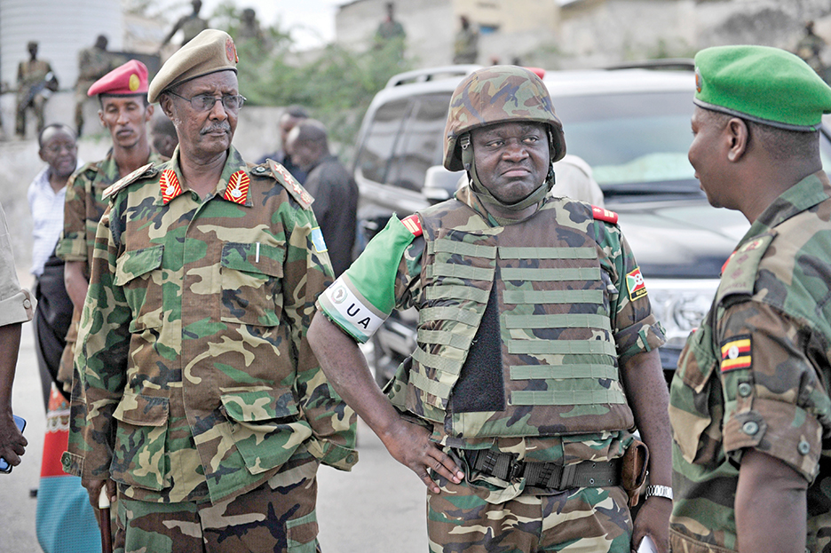 AMISOM Force Commander,  Lt. Gen. Silas Ntigurirwa and Somalia Chief of Defence Forces, Somali's Chief of Defence Forces, Maj. Gen. Dahir Aden Elmi,  receiving a brief about the failed attack by Alshabaab on Parliament building on 24th May 2014.